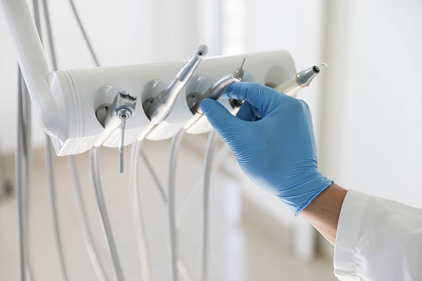 Professional Tooth Extraction technician working in Hempstead County County, AR